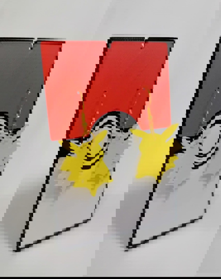 Image Pokemon Paquete Llavero giratorio y aretes